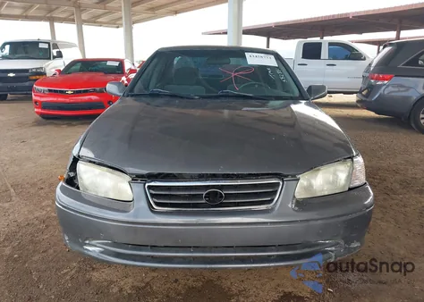 2001 Toyota Camry Le z USA, uszkodzony, nr VIN JT2BG22K010592881